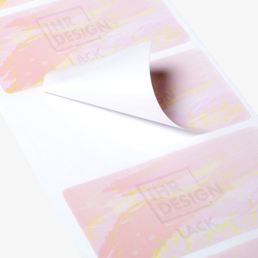 Verdelte Etiketten auf Rolle mit individueller Prägung in Silber, Detailansicht
