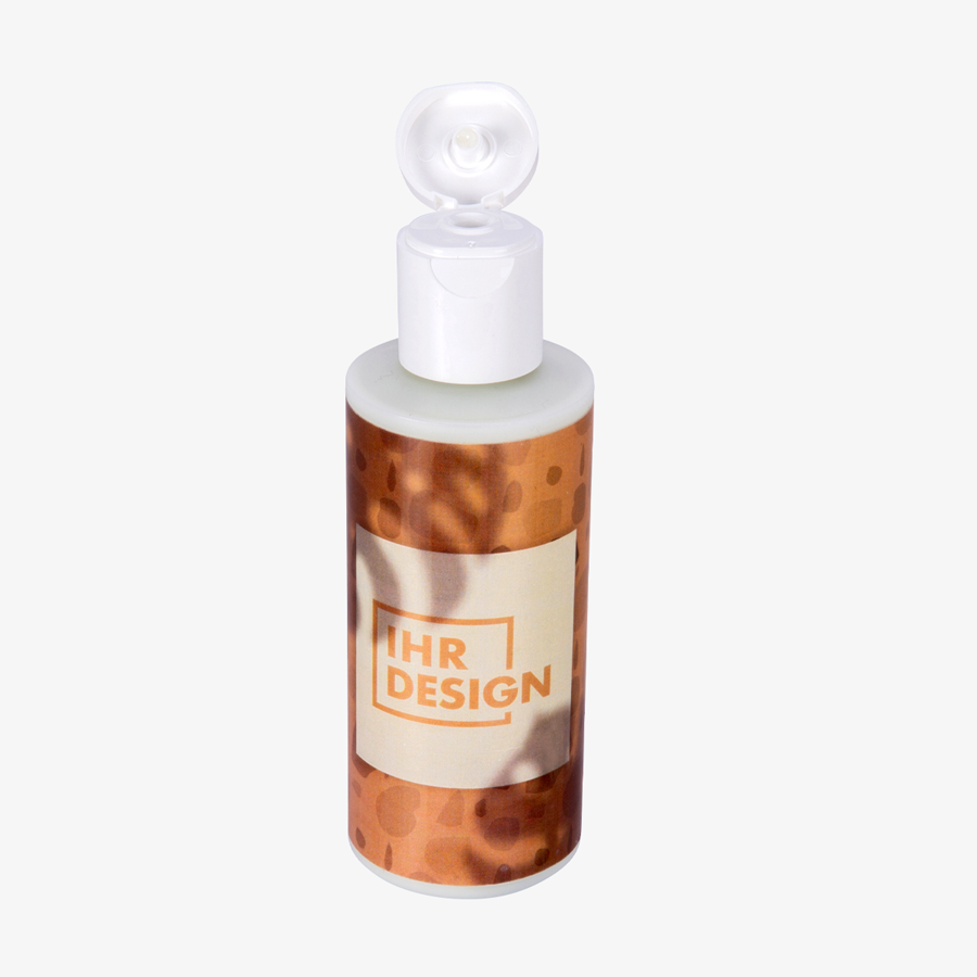 Handcreme im Wunschdesign in 100-ml-Flasche mit geöffnetem Klappdeckel
