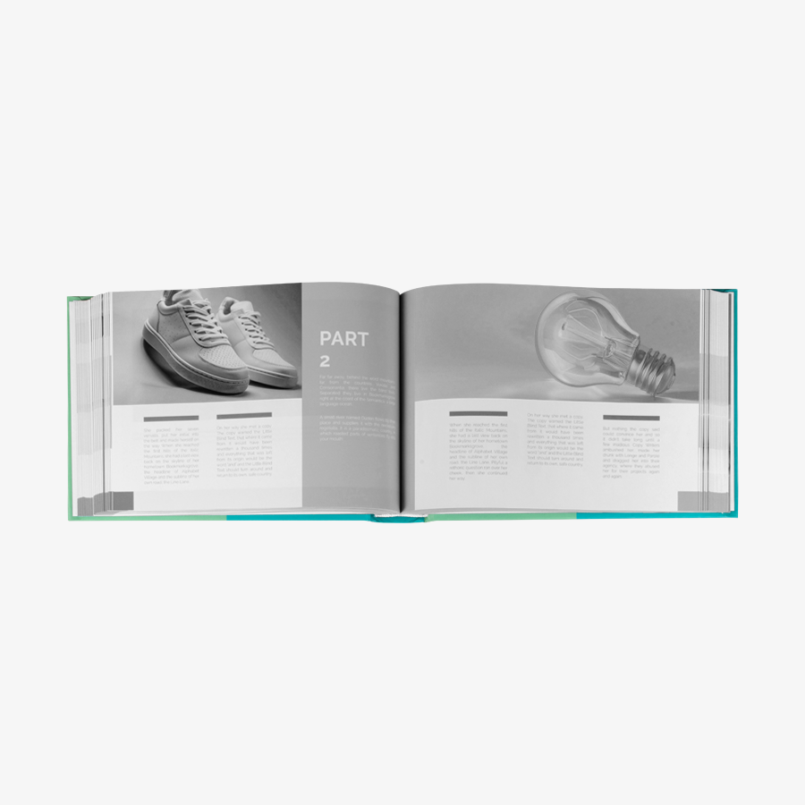 Hardcover Buch mit rundem Rücken aufgeschlagen, schwarz weiss quer