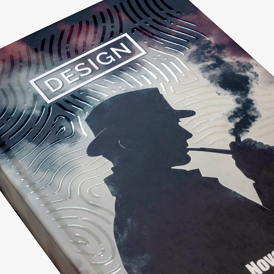 Kompakt-Buch mit Hardcover und geradem Rücken, Detailansicht des mit UV-Lack veredelten Covers