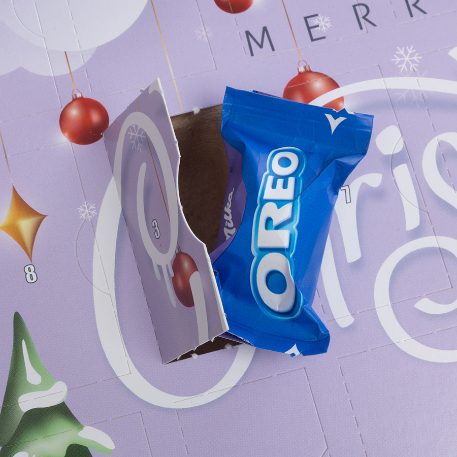 Milka Adventskalender Milkamix Favourites Detailbild mit geöffnetem Türchen