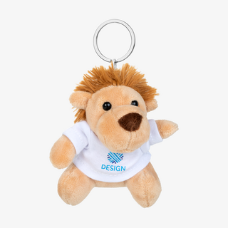 Schlüsselanhänger mit Löwe-Kuscheltier von vorne in der Gesamtansicht, Löwe trägt weisses Shirt mit Druck