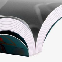 Buch Softcover, SW bedruckt, liegend aufgeschlagen, details