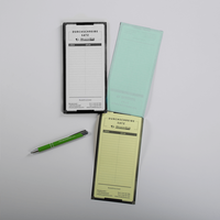  Durchschreibesätze mit Stift, bedruckt, liegend