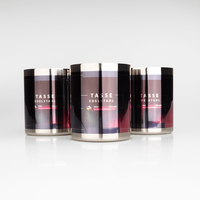 drei Edelstahltassen, frontal fotografiert, Fotodruck sichtbar