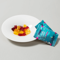 Tütchen, farbig bedruckt, liegend mit Fruchtgummi