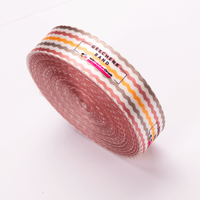 Geschenkband, farbig bedruckt, eingerollt