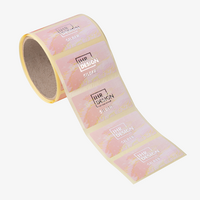 Hochwertige Etiketten auf Rolle mit Silber Prägung rund farbig bedruckt