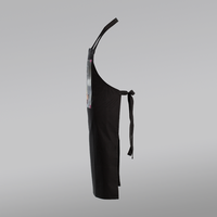 Stoffschuerze schwarz, farbig bedruckt, seitenansicht